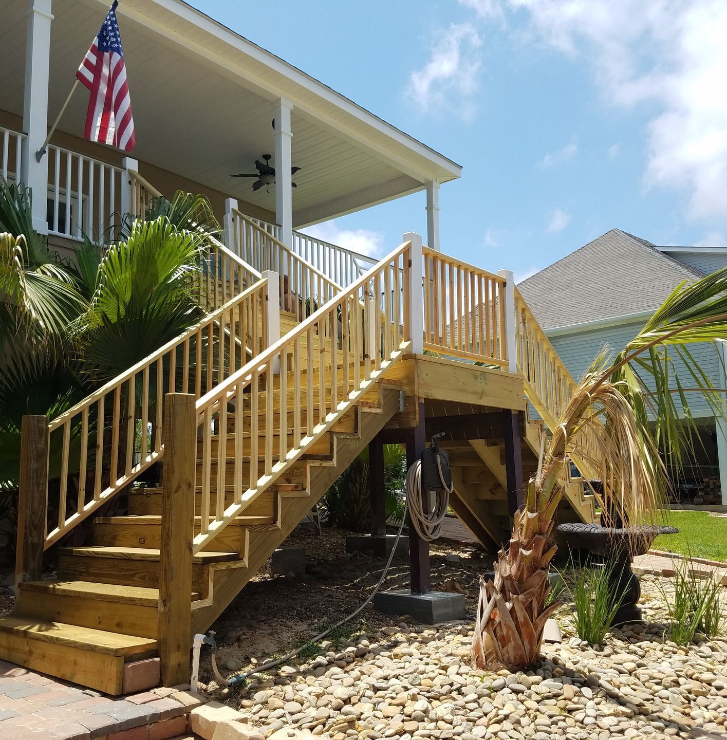 Wooden deck stairs with American flag