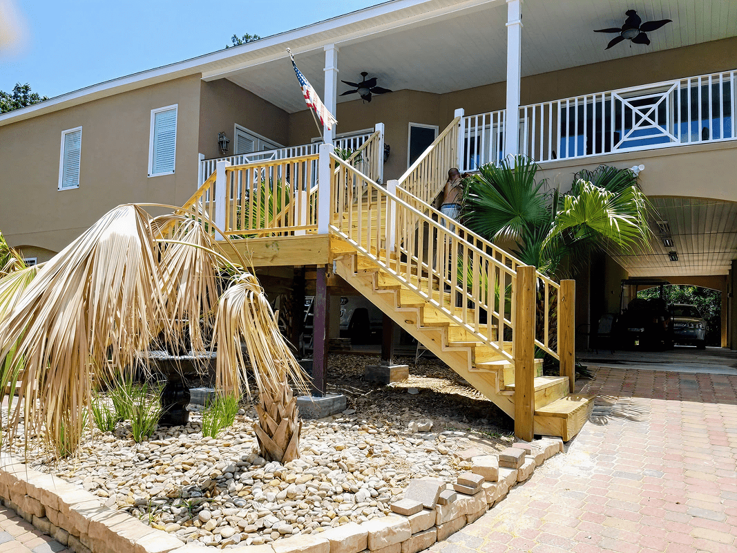 Elevated house with wooden staircase